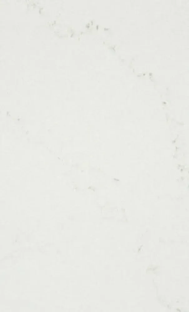 Off-white quartz countertop with subtle veining and small speckles.