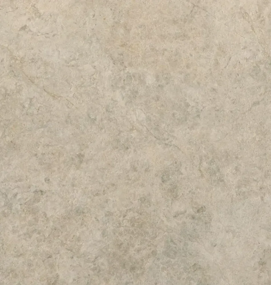Beige and tan marble-like stone surface.