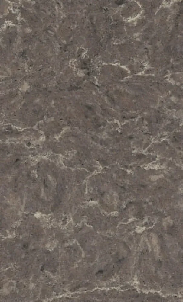 Close-up of a dark gray quartz countertop with light beige veining and a speckled texture.