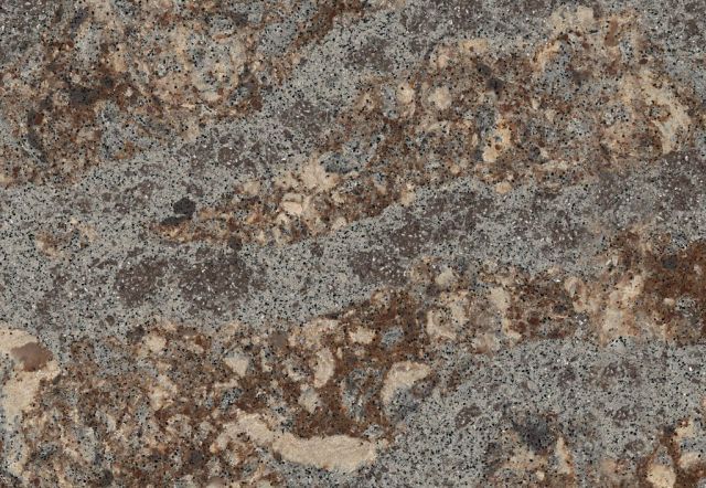 Close-up view of textured, mottled stone surface with gray, tan, and brown hues.