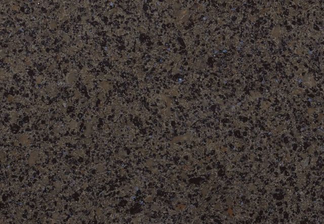 Close-up view of dark brown, speckled granite surface.