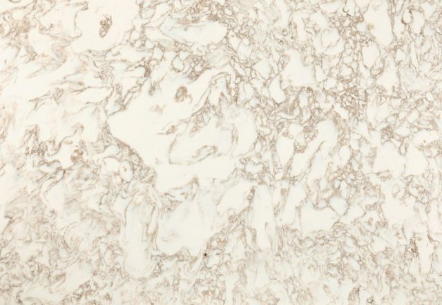 Cream-colored surface with swirling brown veining, resembling marble or stone.