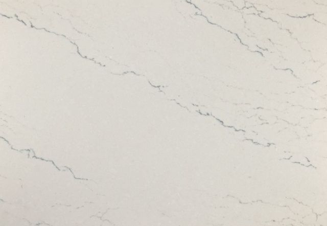 White countertop with subtle gray veining.