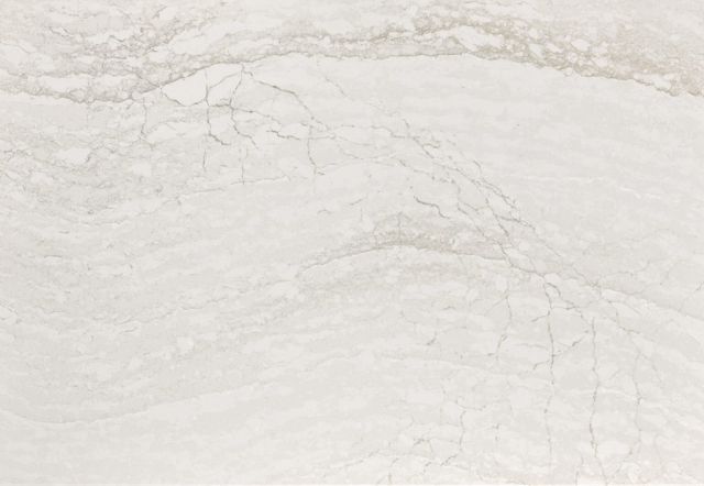 White and gray marbled stone with flowing veins and cracks.