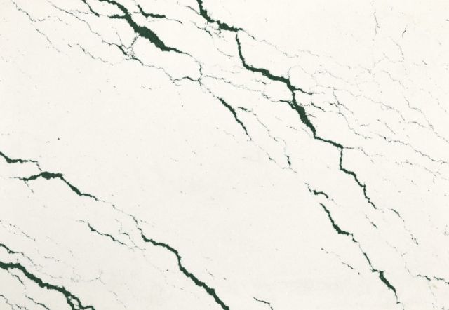 White countertop with dark green veining.