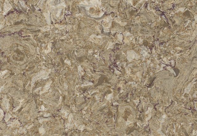 Tan quartz countertop with swirling patterns and light and dark areas.