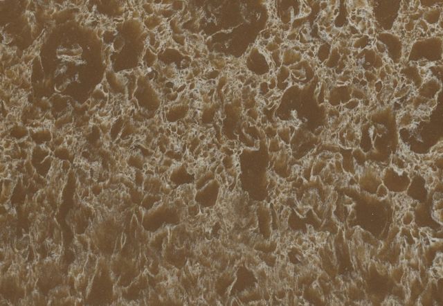 Brown and off-white quartz countertop with a textured, speckled appearance.