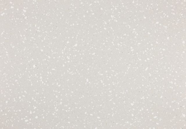 White speckled surface.