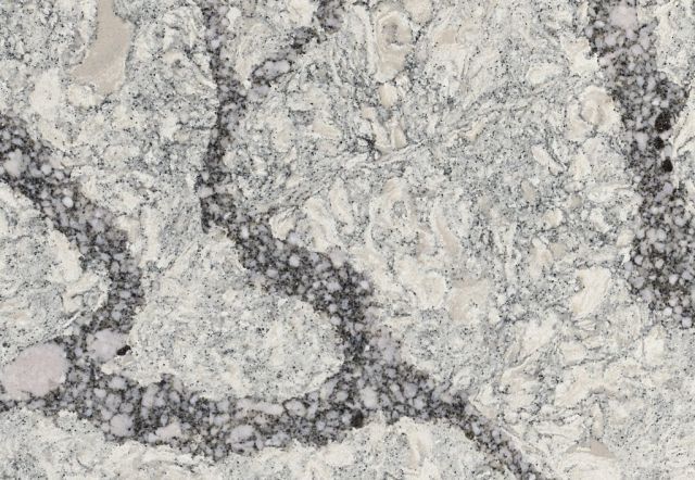 White and gray marble-like surface with dark gray veining.
