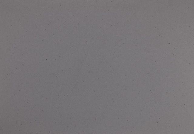 Plain, solid, light gray wall surface with slight texture.