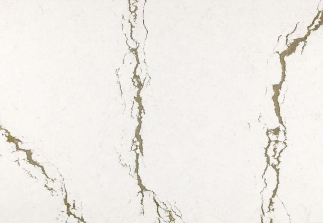 White stone surface with gold-toned veining.