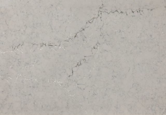 White countertop with gray veining.