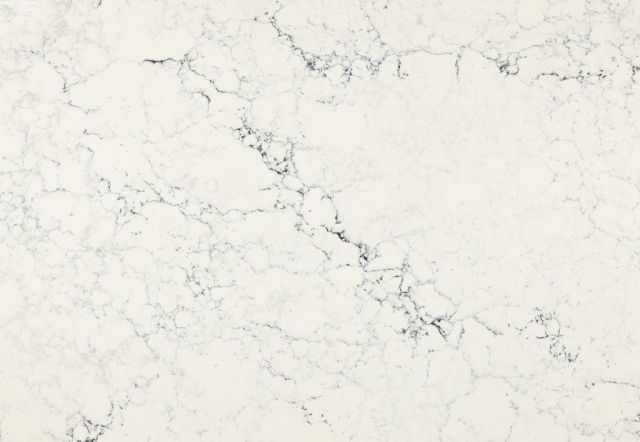 White marble countertop with gray veining.