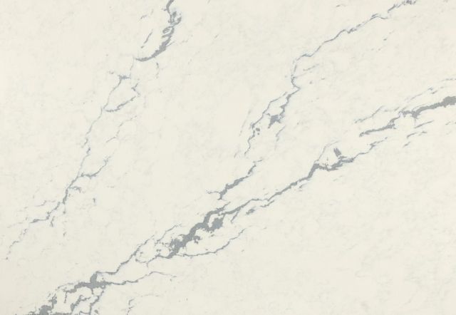 White marble countertop with gray veining.