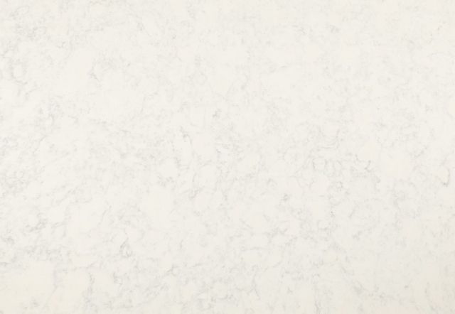 Cream-colored marble with subtle gray veining, suitable for countertop or surface.