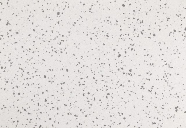 White surface with scattered gray speckles.