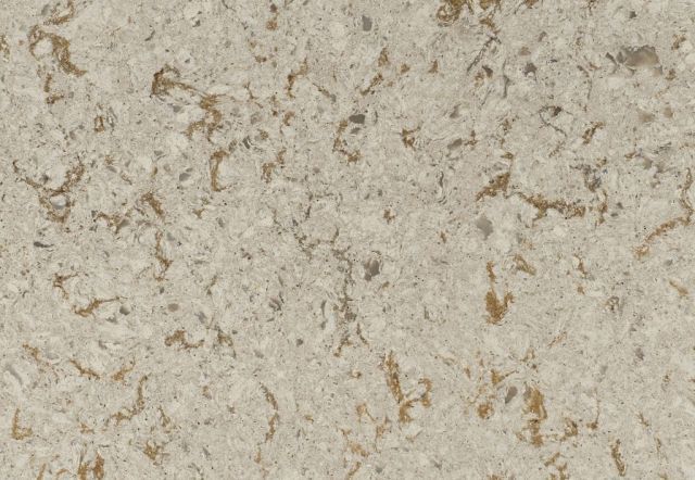Beige stone surface with gold-brown veining and small speckles.