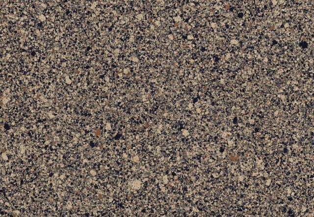 Granite countertop, mottled gray and tan with speckled texture.