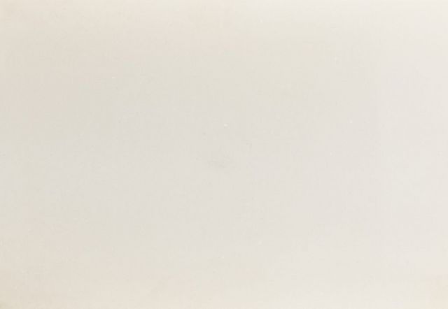 Off-white, textured background.