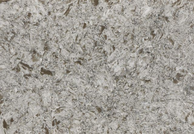 Light gray quartz countertop with varied texture.