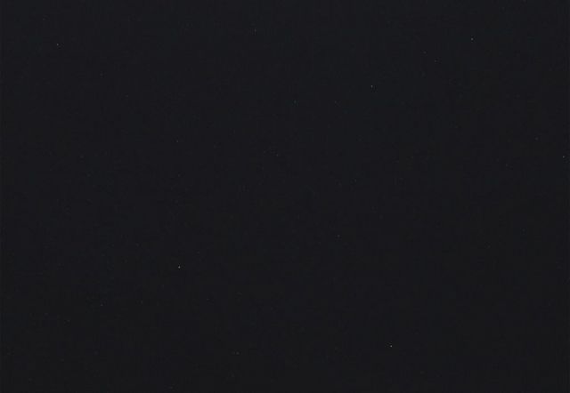 Solid black background.