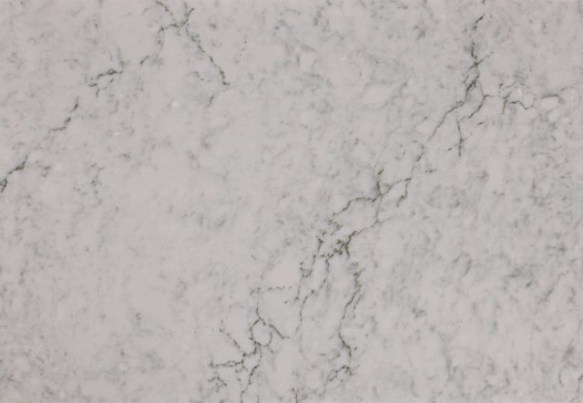 White marble with gray and green veining.