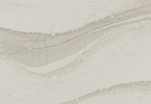 Off-white marble countertop with wavy, light grey veins.