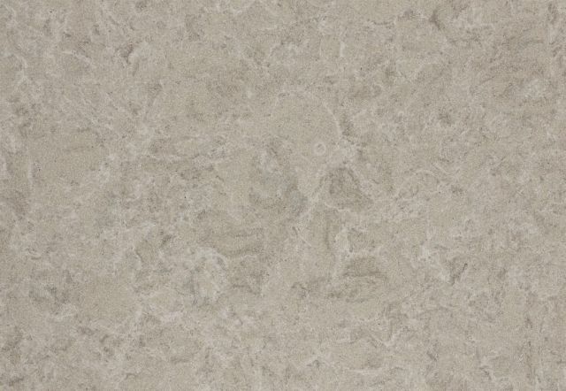 Light beige stone surface with swirling patterns.