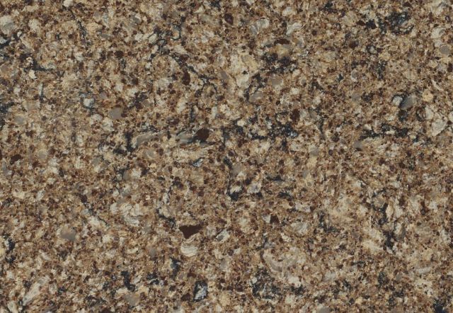 Textured surface, speckled with light tan, brown, and gray granules, resembling granite or stone.