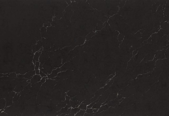 Dark gray stone surface with white veining.