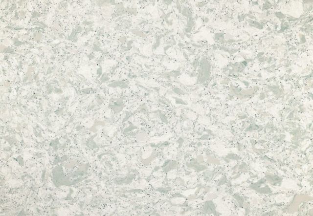 Light-colored countertop with swirling pale blue-green and flecks of dark grey.