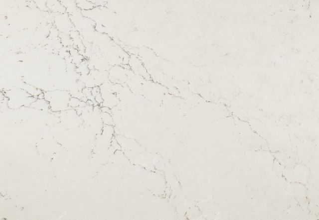 White countertop with subtle gray veining.