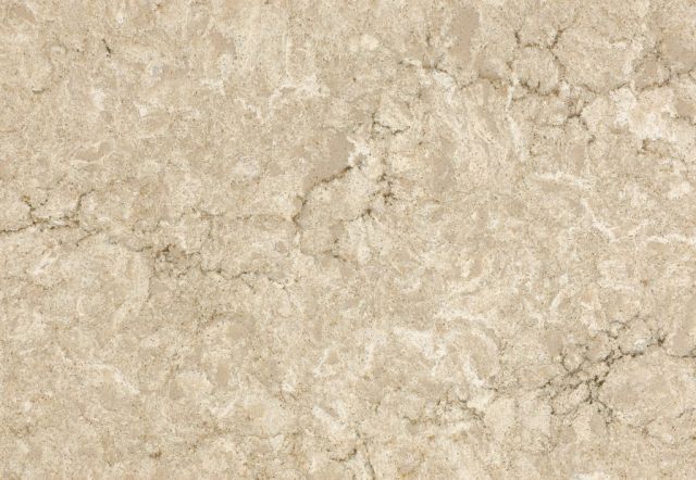 Beige marble countertop with veining.