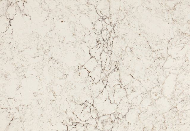 Cream-colored countertop with gray veining resembling marble.