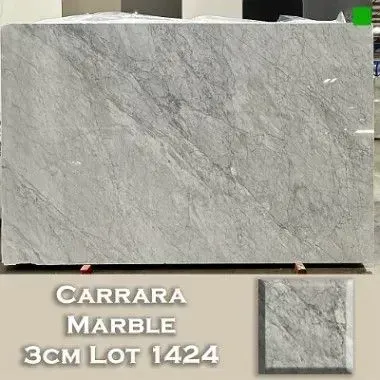 Carrara marble slab, gray with veining. Sample tile inset.