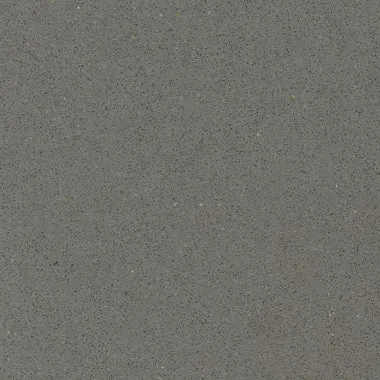 Gray quartz countertop with speckled appearance.