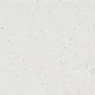 Off-white textured wall with small dark specks.