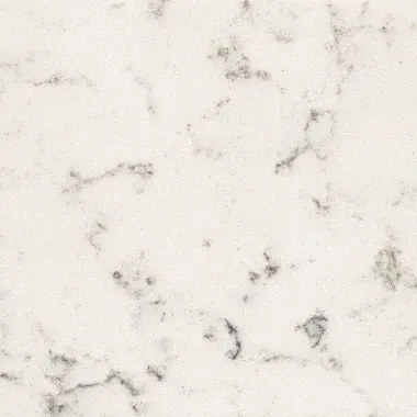 Creamy white countertop with dark gray veining, resembling marble.