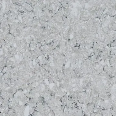 Light gray quartz countertop with white and dark gray veining.