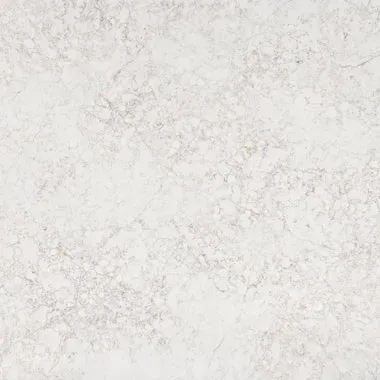 White and gray marble-like stone with subtle veining and a textured surface.