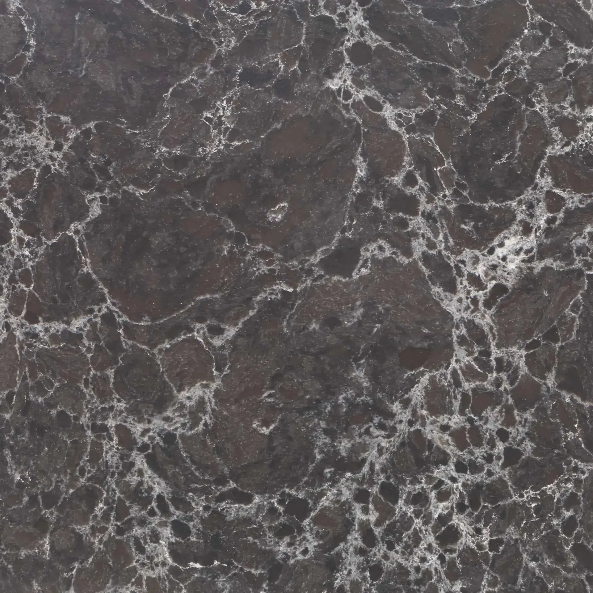 Dark gray and silver speckled stone surface.