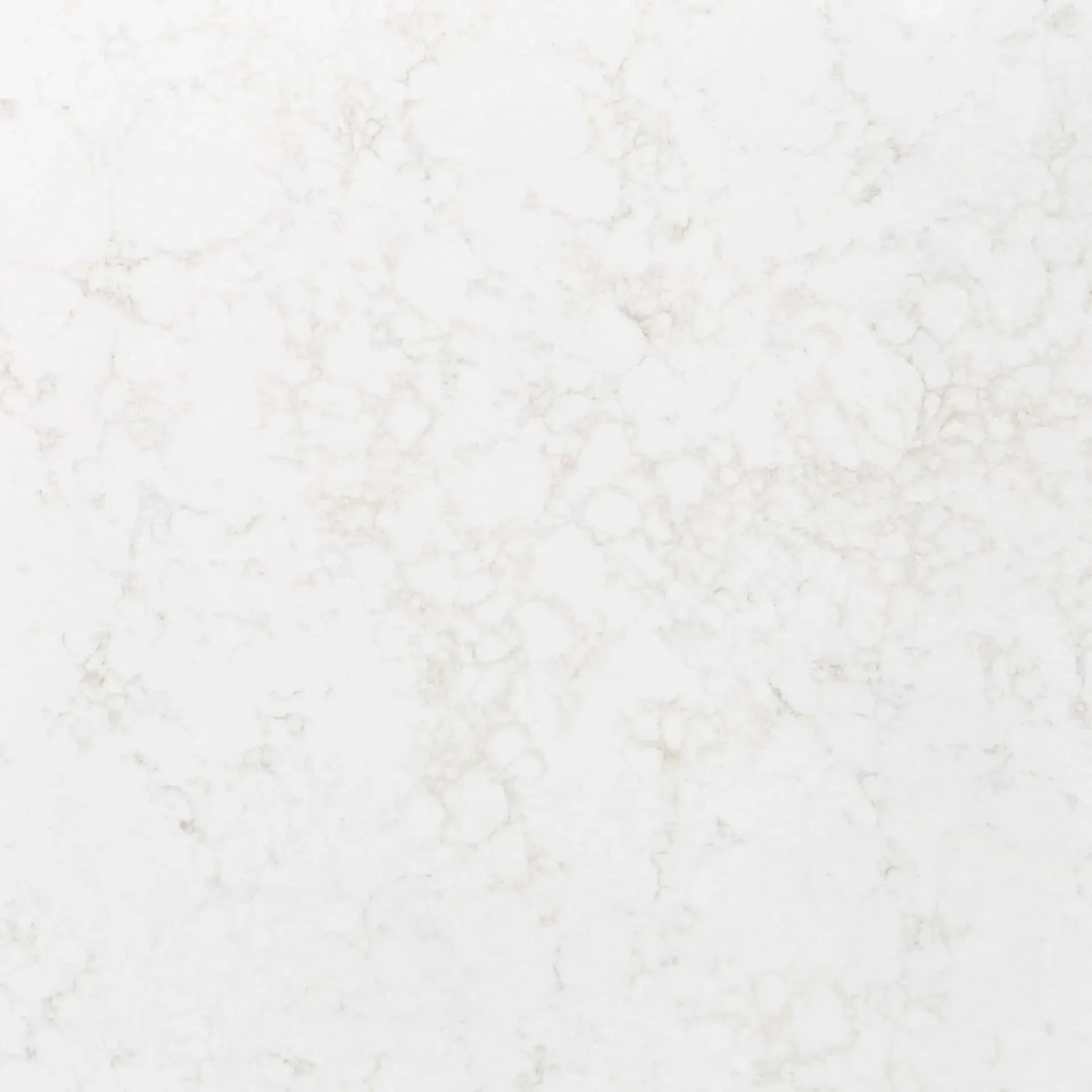 White quartz countertop with subtle, light gray veining.