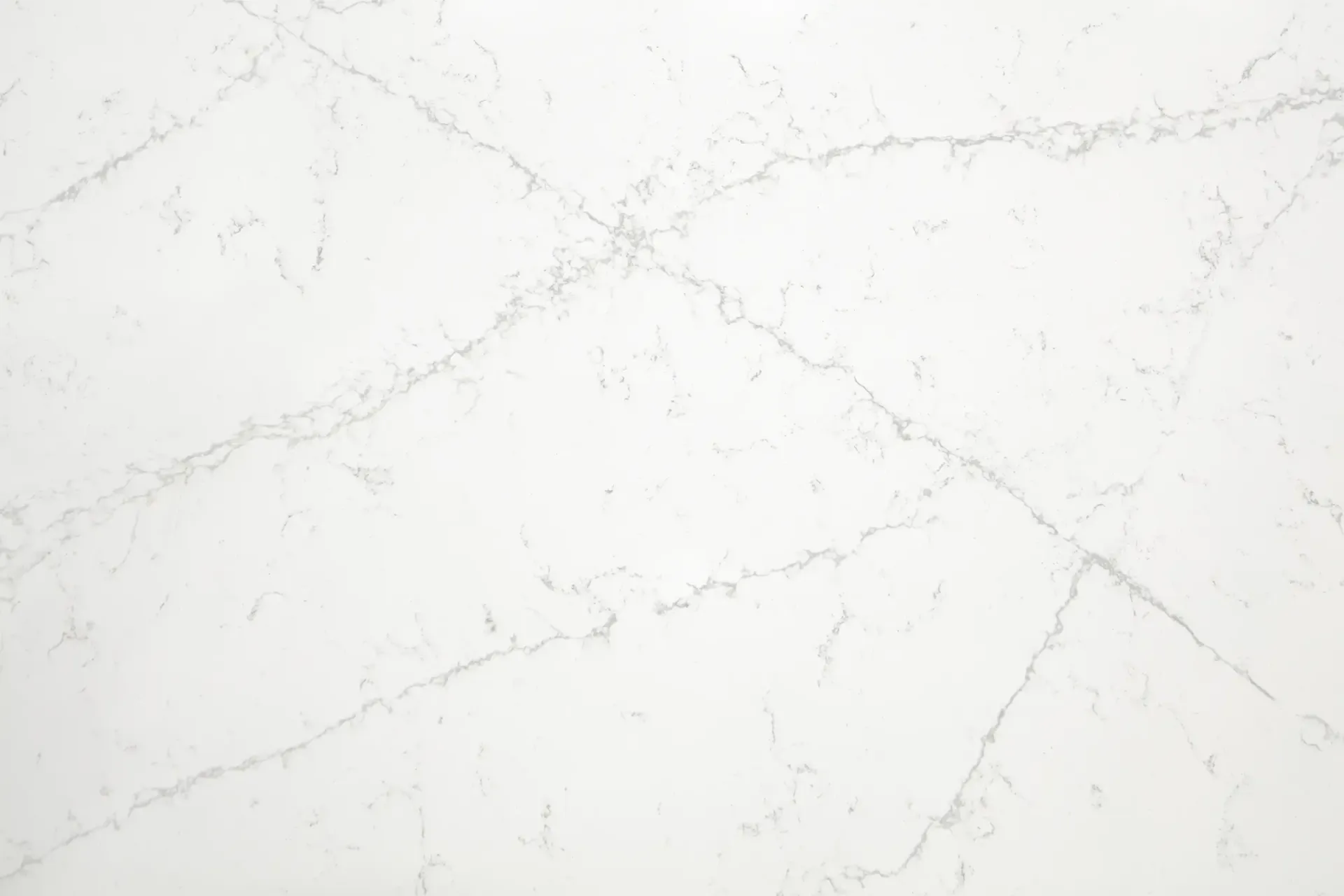 White quartz countertop with gray veining.