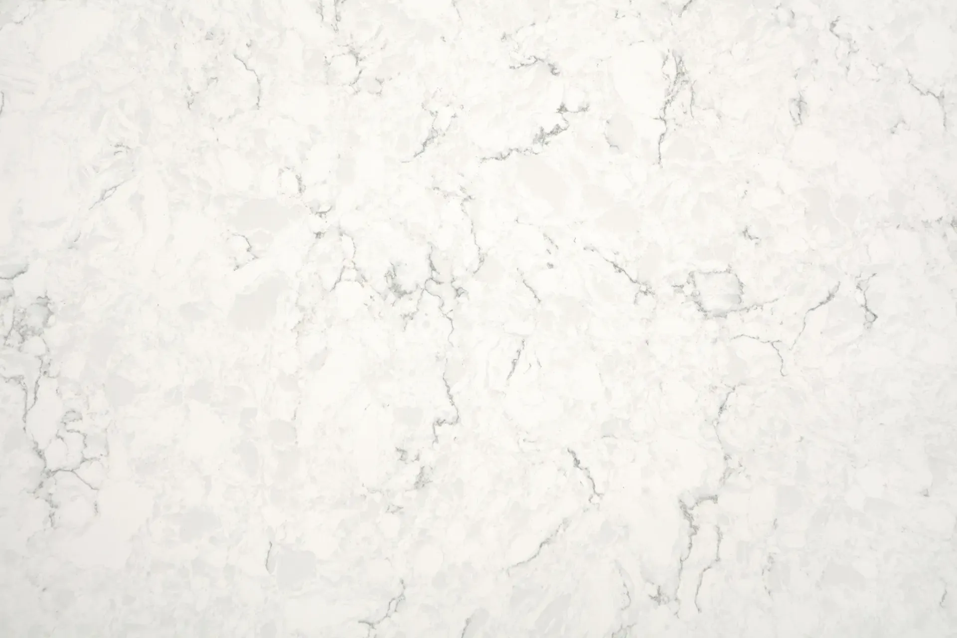 White quartz countertop with grey veining.