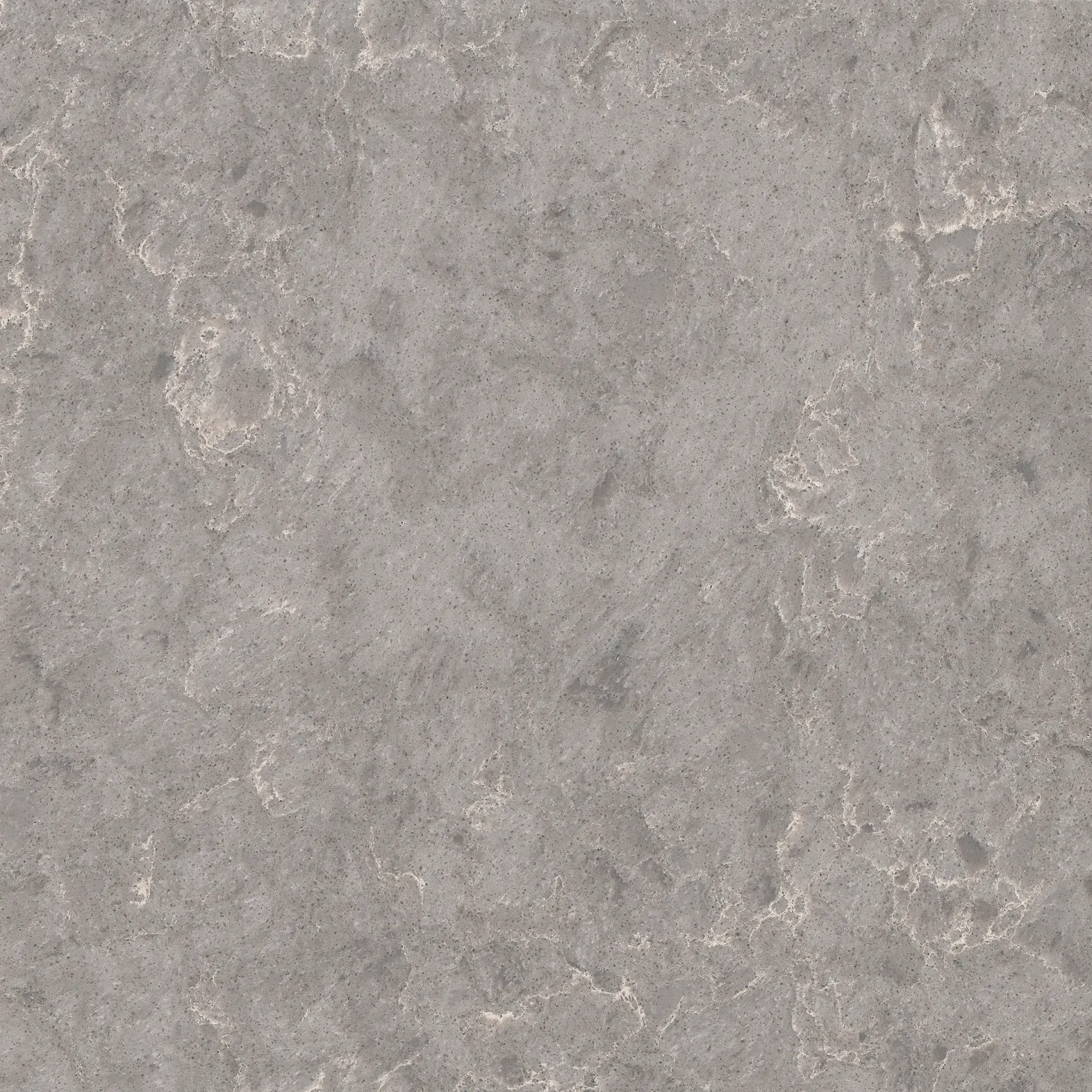 Gray quartz countertop with speckled texture and subtle light veining.