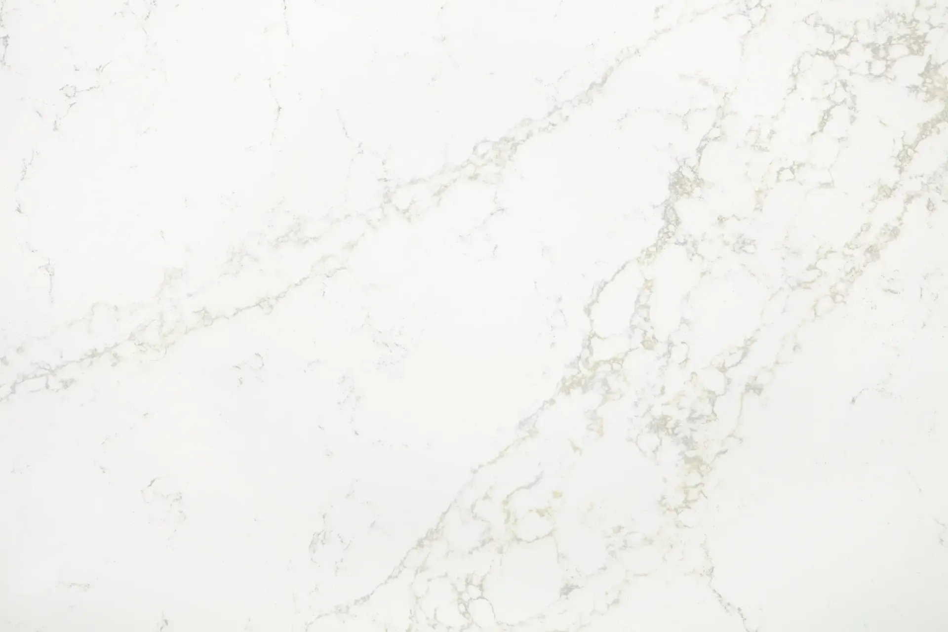 White marble countertop with subtle gray veining.
