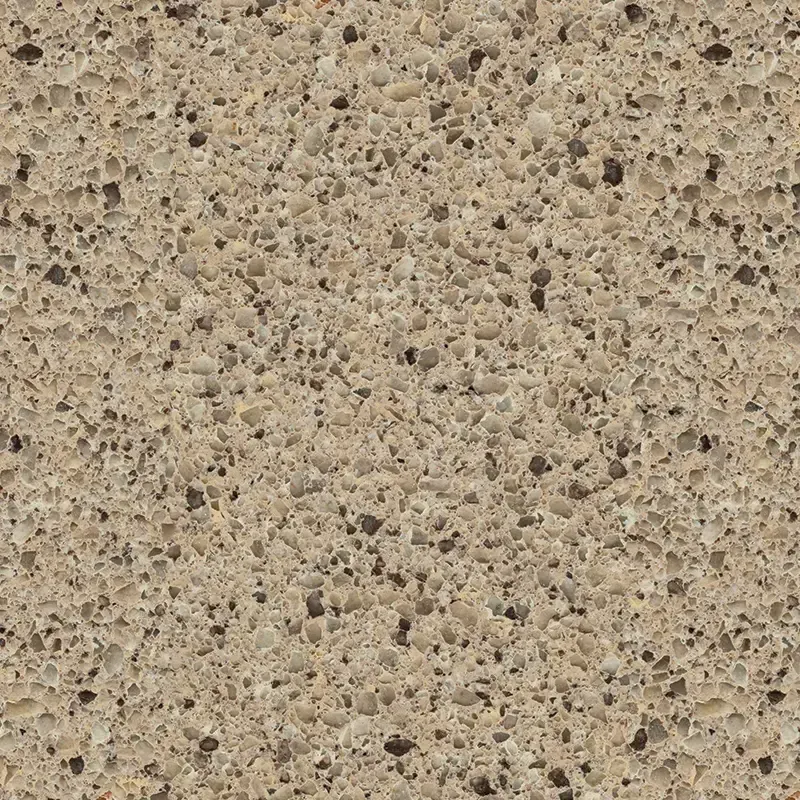 Beige quartz countertop with flecks of darker minerals.