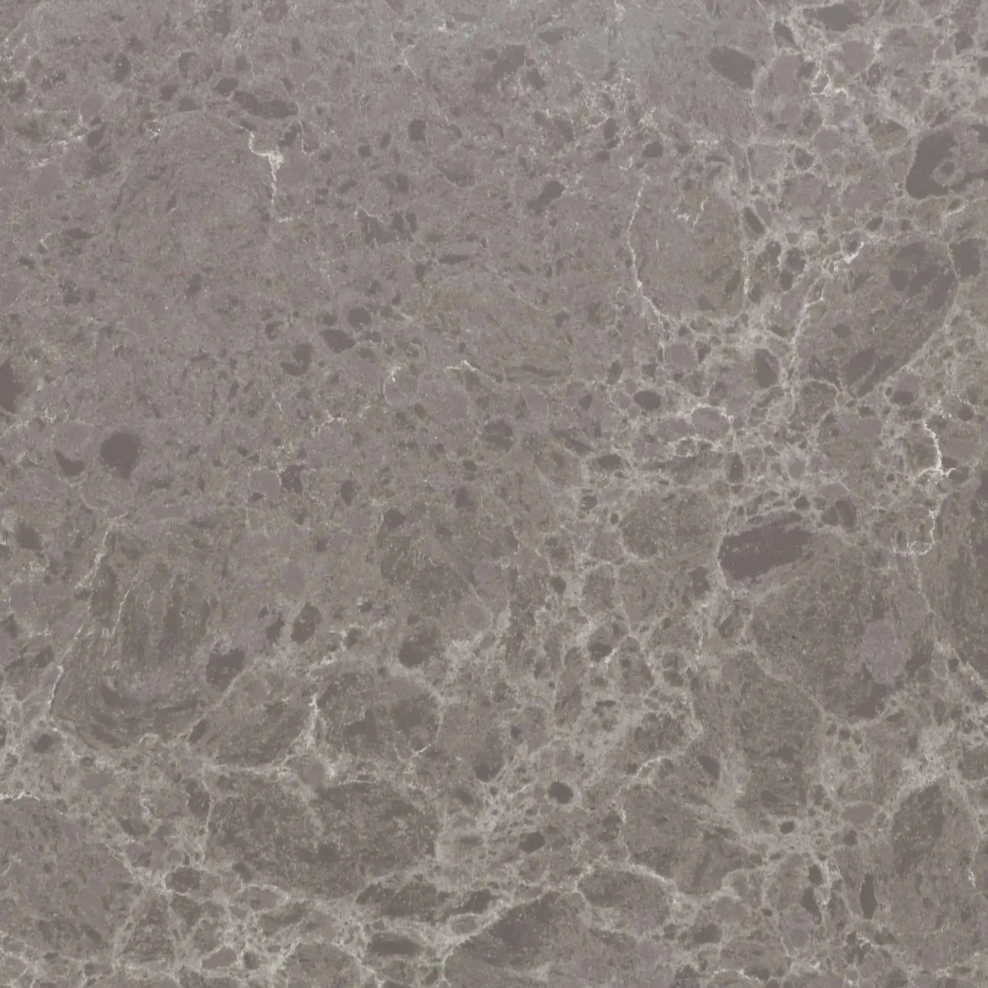 Gray countertop with speckled and veined pattern.