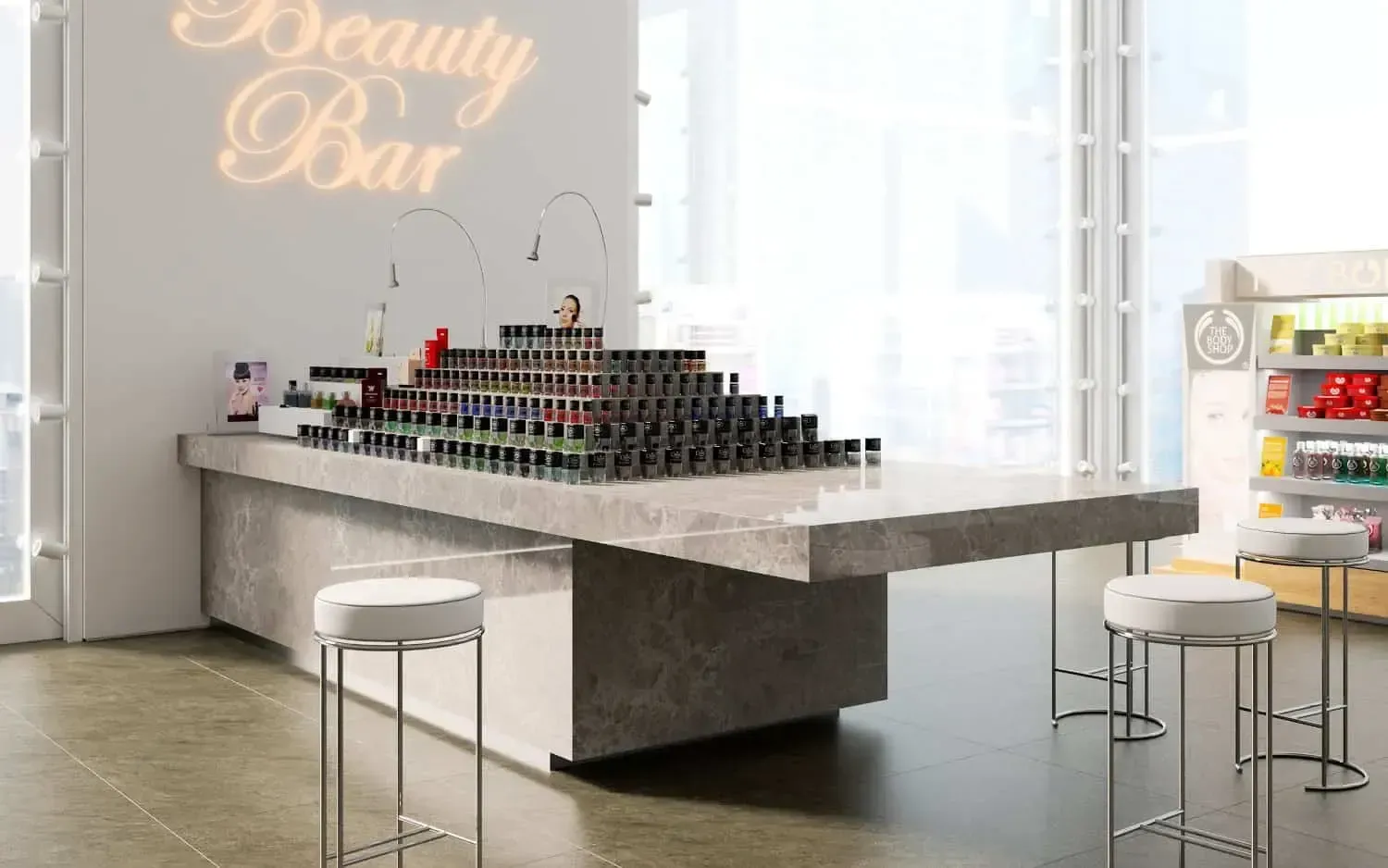 Beauty bar with a large display of cosmetics on a stone counter. Three white stools are in front of the bar.