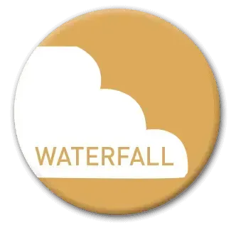 Badge with gold background; white waterfall steps; text: WATERFALL.